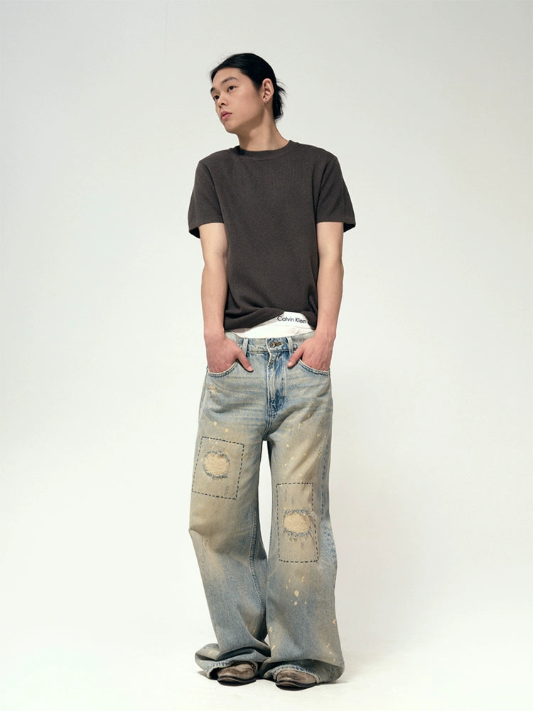 Hand stitch distressed jeans