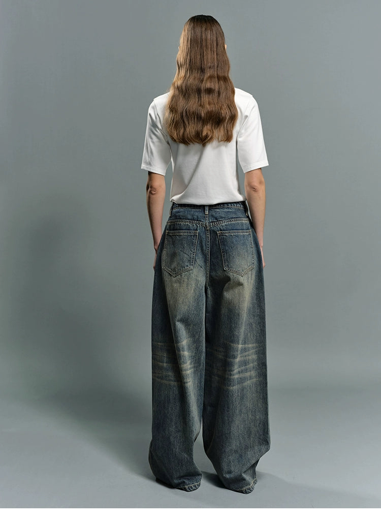 Distressed vintage wash baggy jeans
