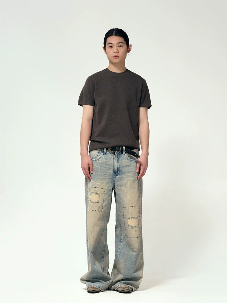 Hand stitch distressed jeans