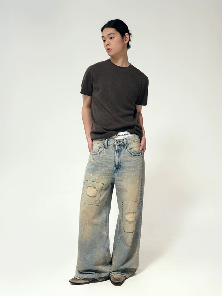 Hand stitch distressed jeans