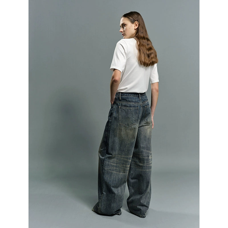 Distressed vintage wash baggy jeans