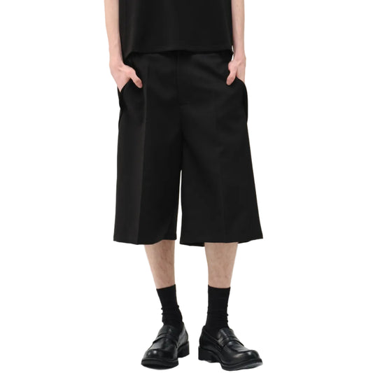 Deconstructs loose-leaf cropped pants