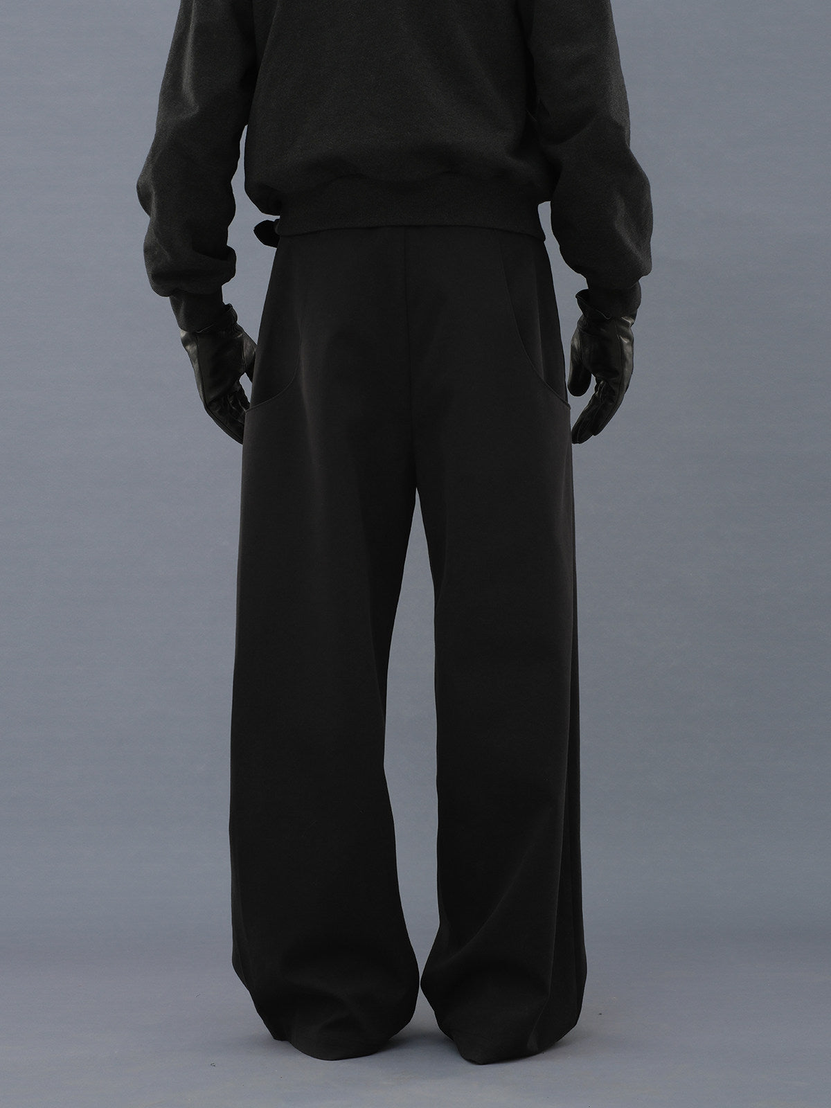 Curved pocket trousers