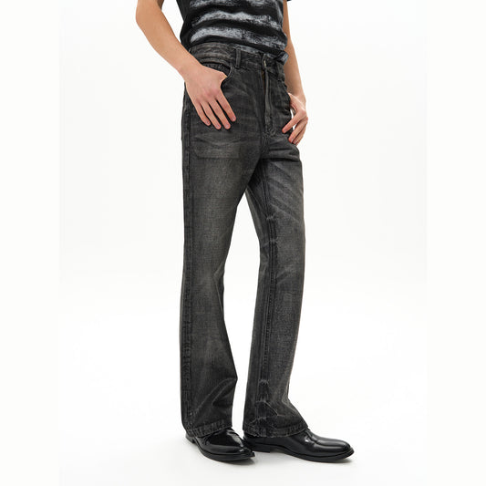 Rubber wax bootcut jeans