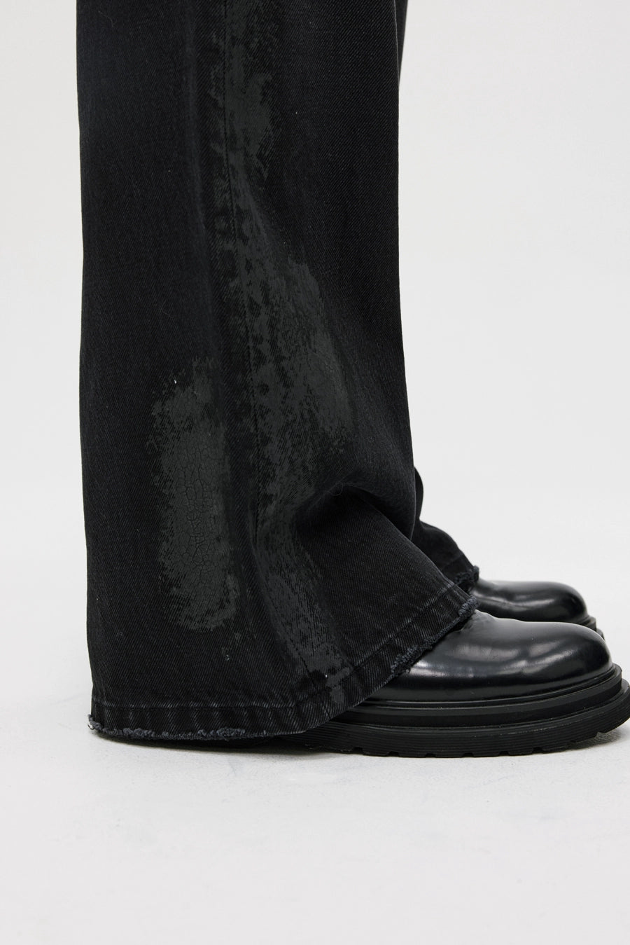 BLACK COATED BOOTCUT JEANS