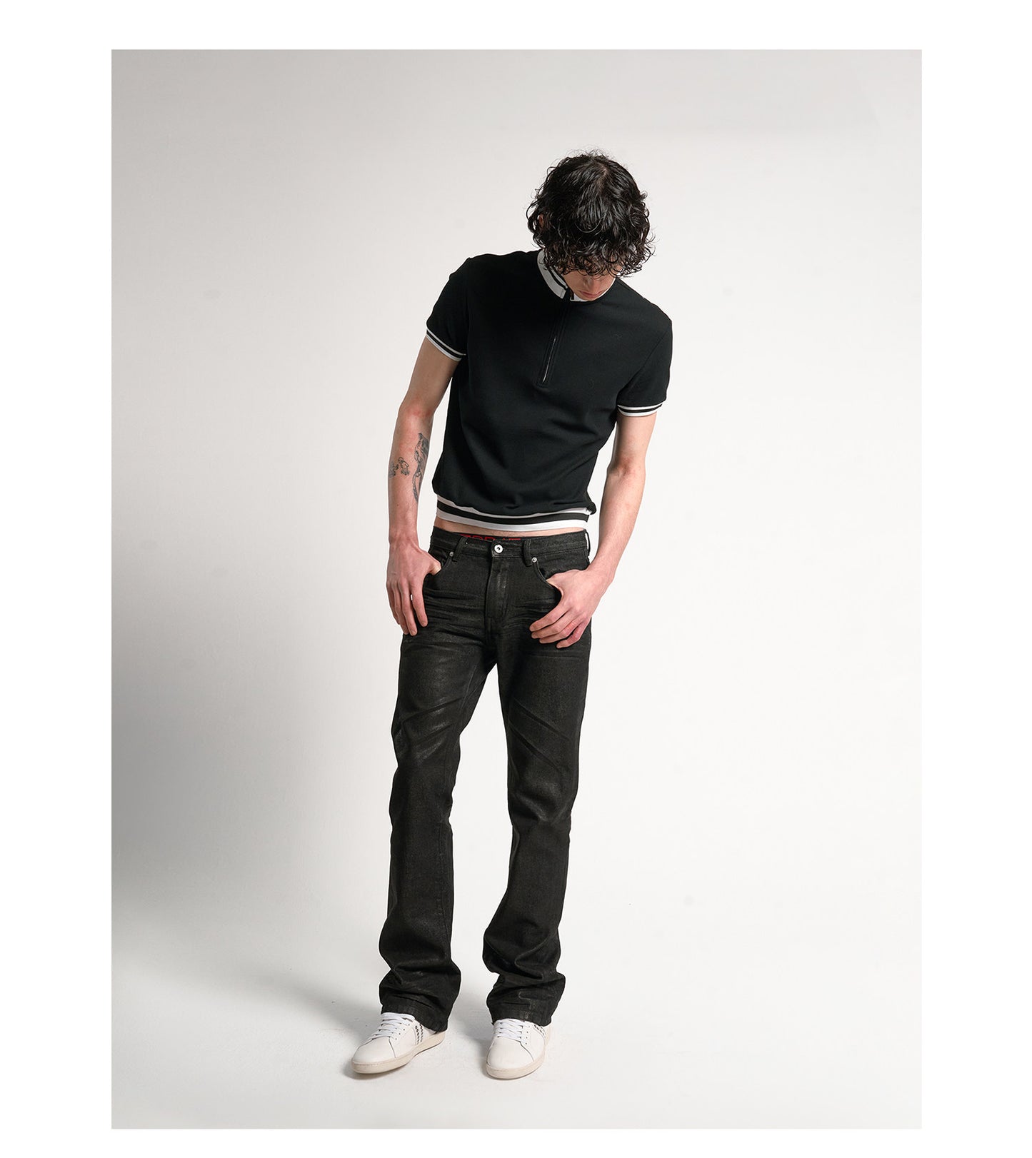 Wax coated bootcut jeans