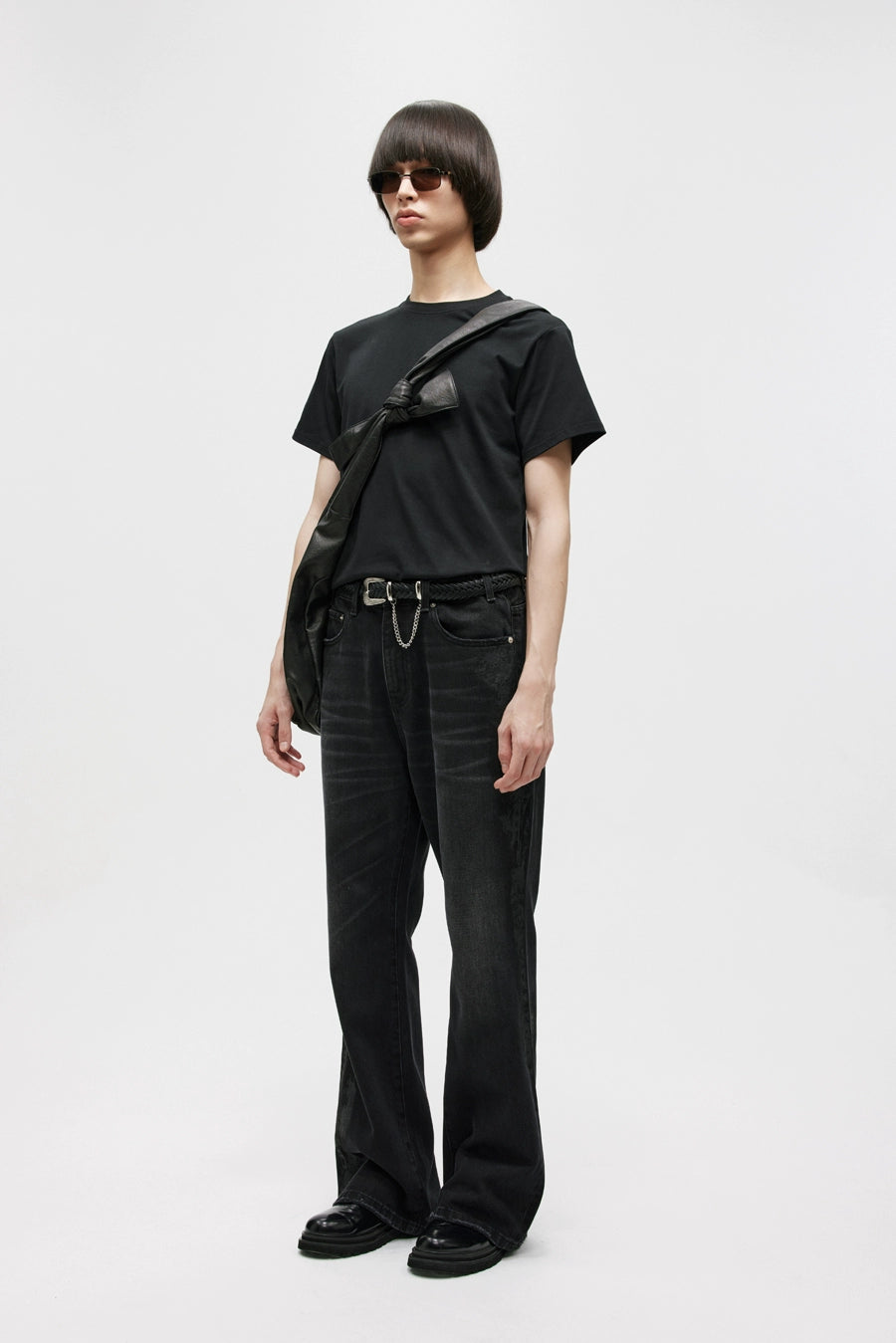BLACK COATED BOOTCUT JEANS