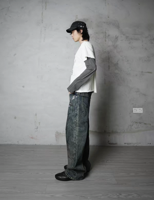 Mud-dyed splashed painter denim jeans