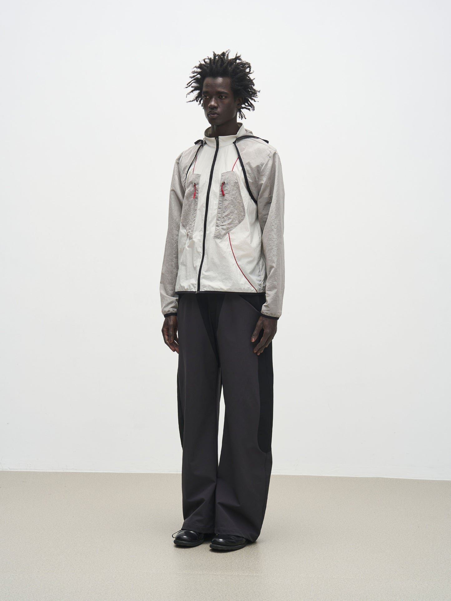 'Triangle' panel loose straight-leg softshell casual trousers