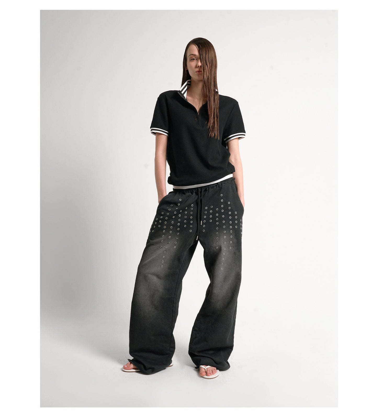 Hollow rivets washed baggy distressed sweatpants