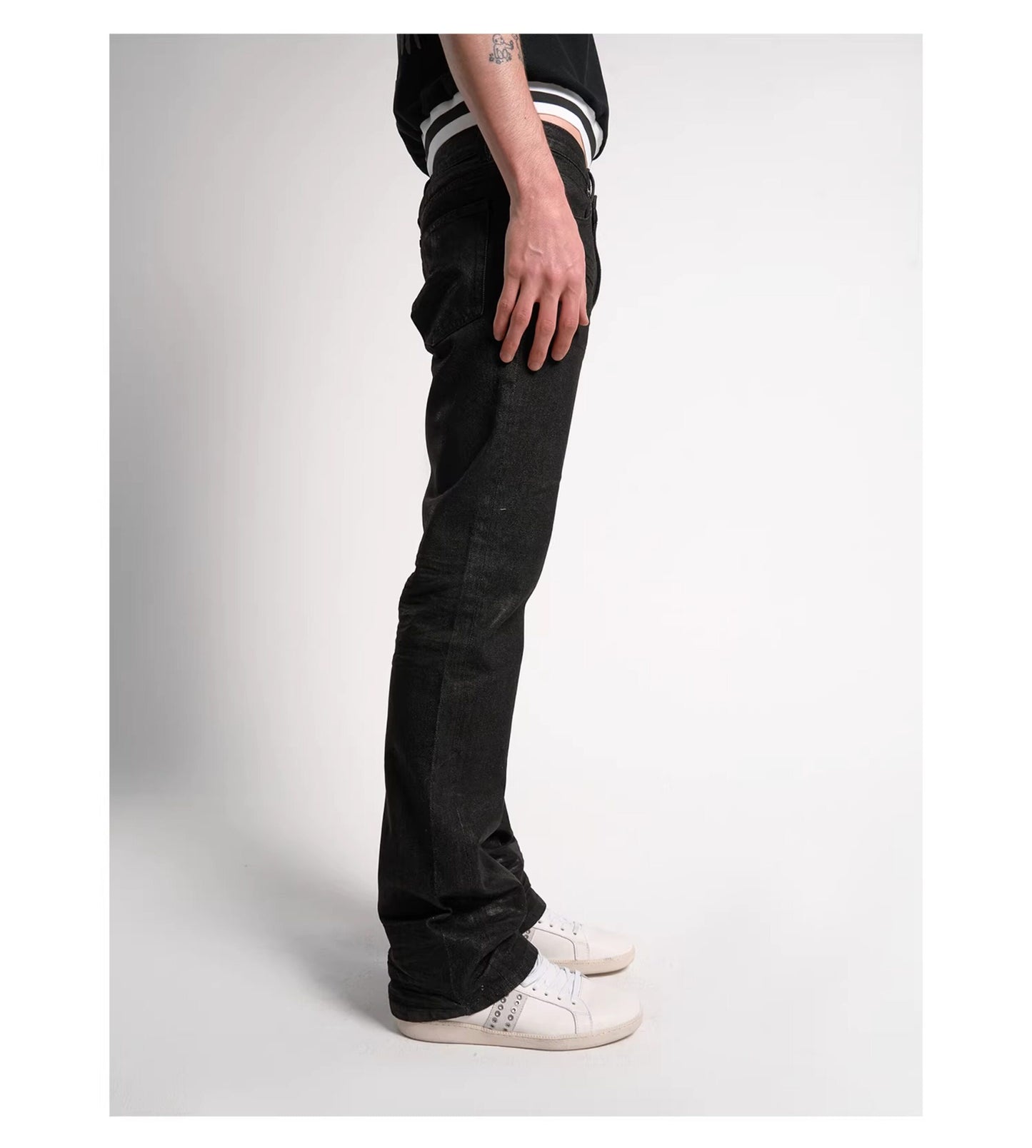 Wax coated bootcut jeans
