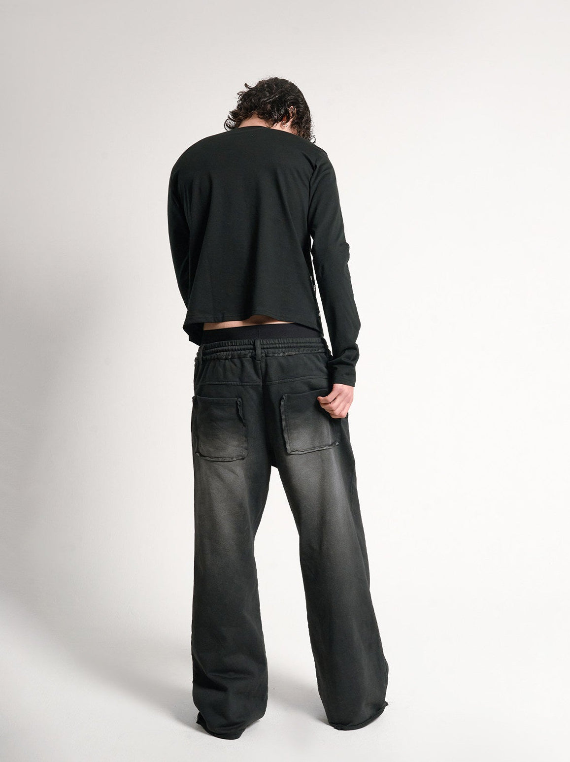 Hollow rivets washed baggy distressed sweatpants