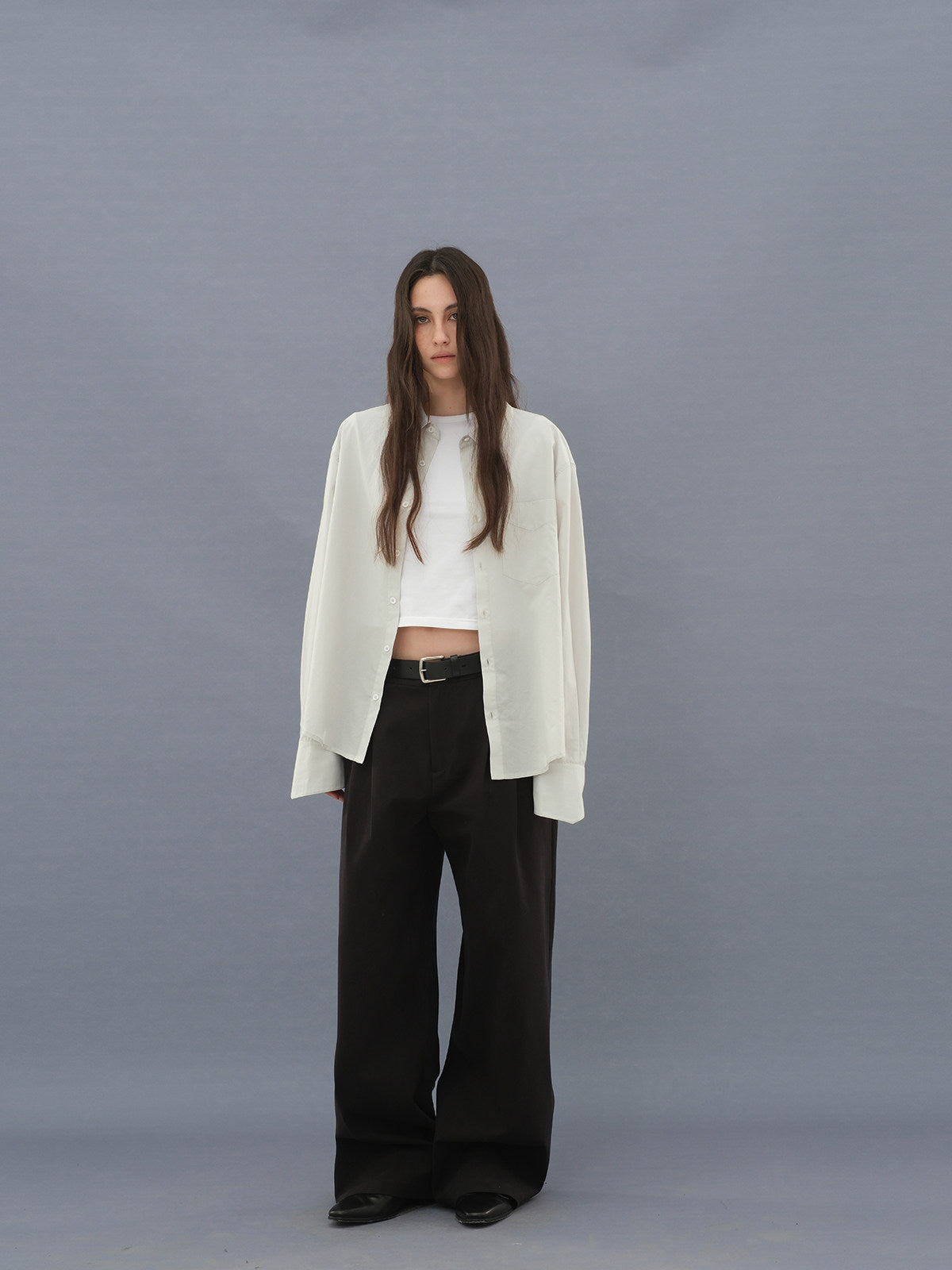 Curved pocket trousers