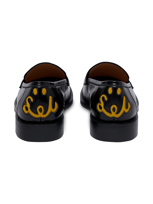 Oil wax cowhide smiley face embroidered loafers