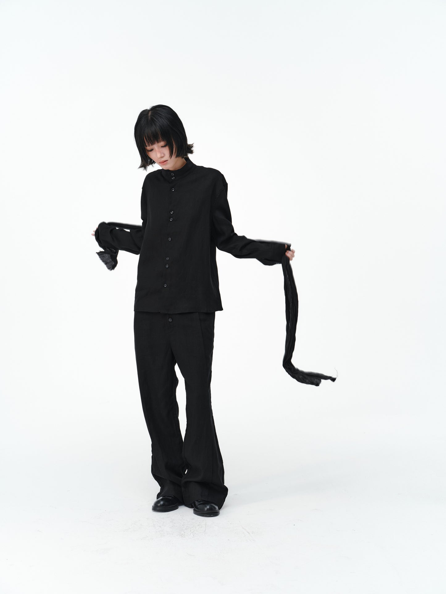 Vertical pleats draped trousers