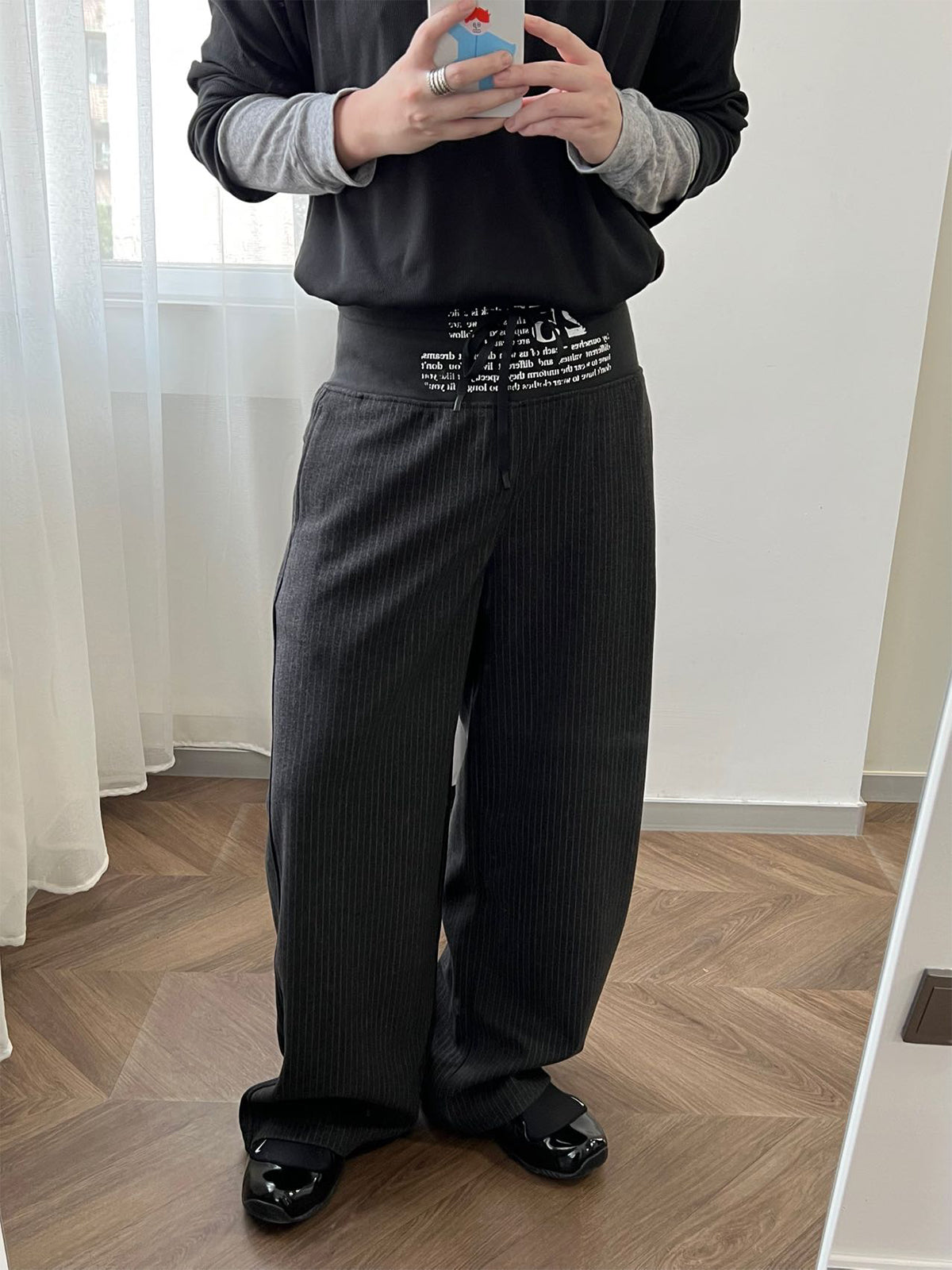 'stitch' cut wool mid-rise printed trousers
