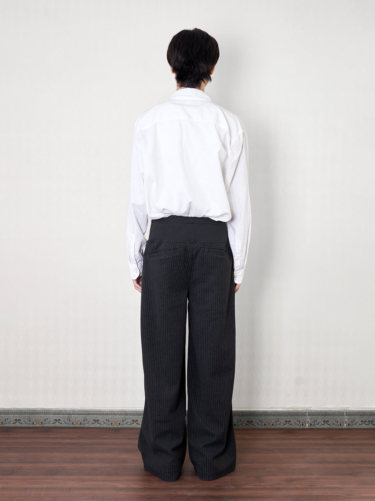 'stitch' cut wool mid-rise printed trousers
