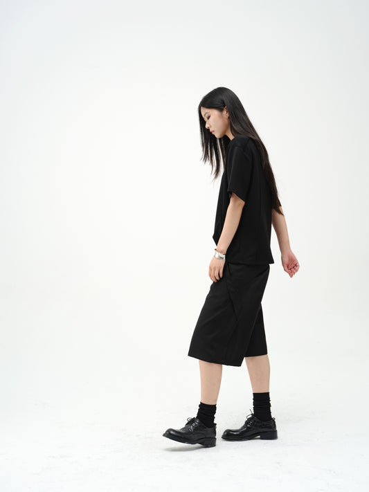 Deconstructs loose-leaf cropped pants