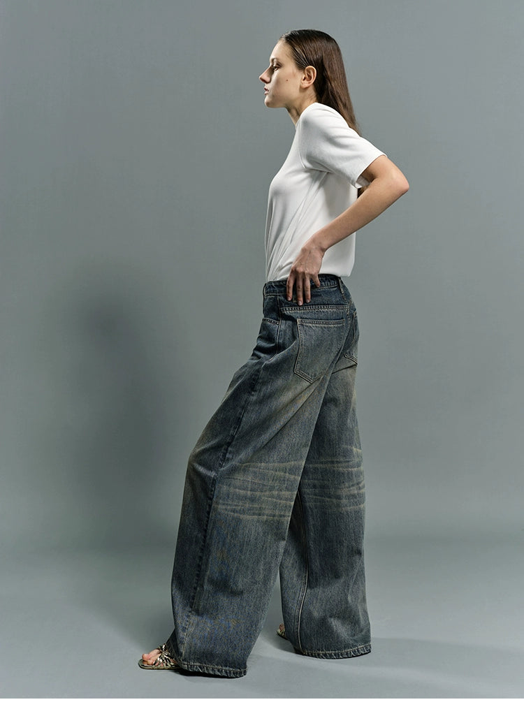 Distressed vintage wash baggy jeans