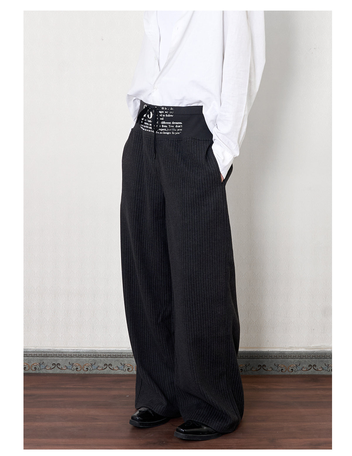 'stitch' cut wool mid-rise printed trousers