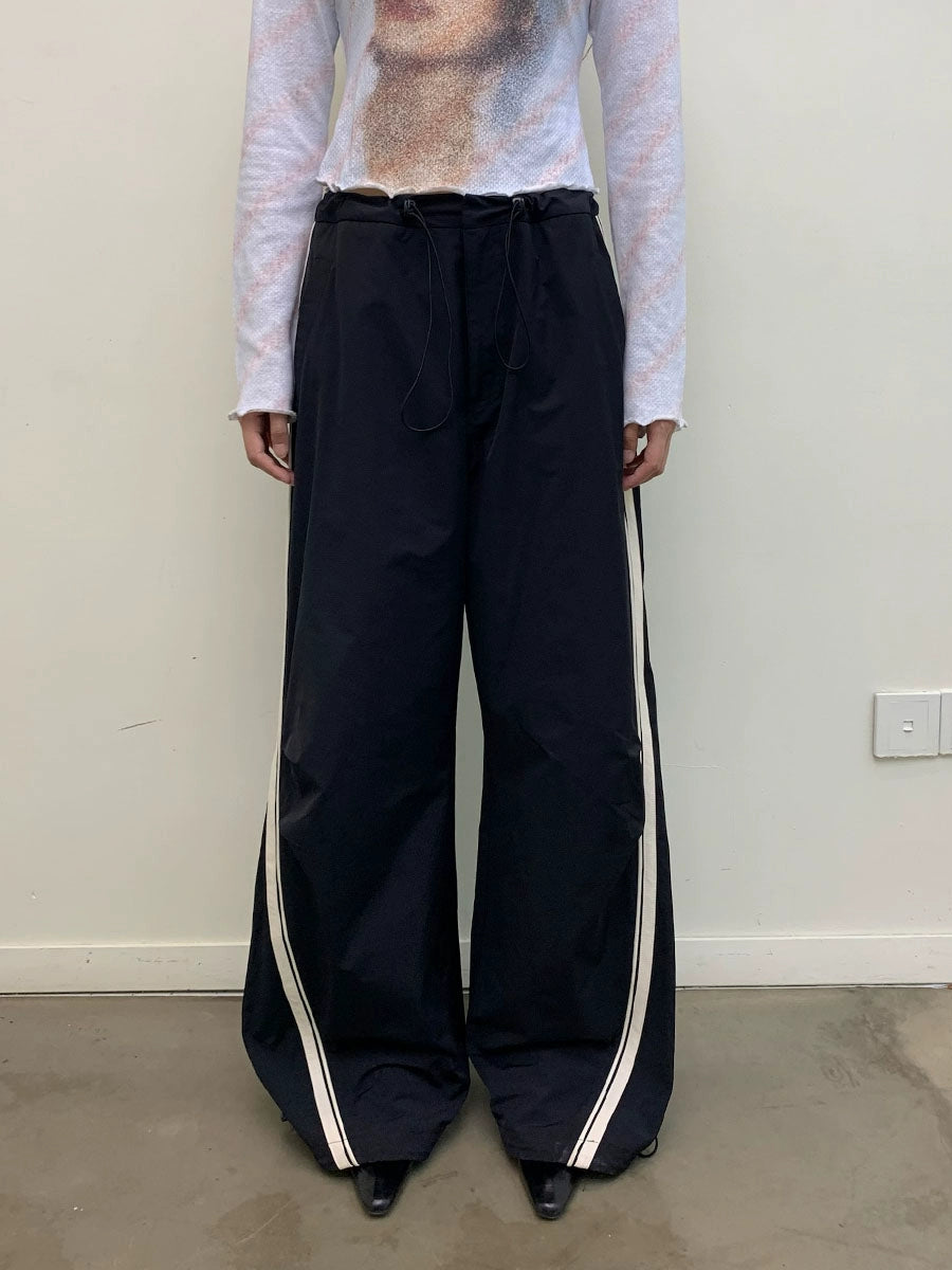 CONTRASTING LEATHER STRIPE TRACK PANTS