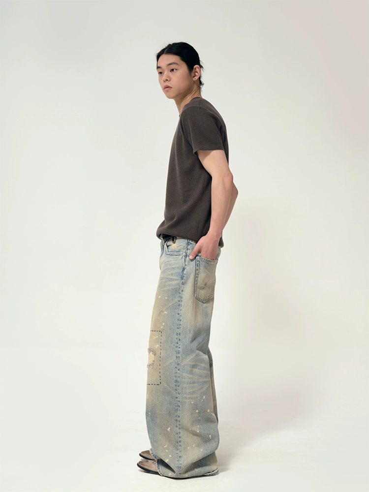 Hand stitch distressed jeans