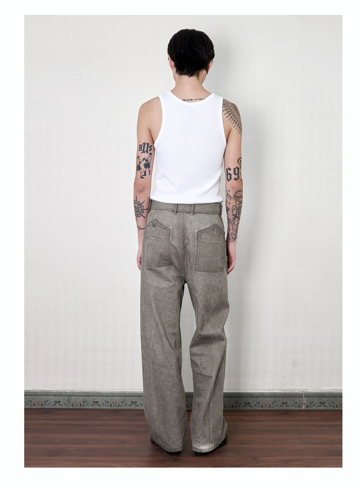 'Gneiss' mud dyed distressed belted trousers