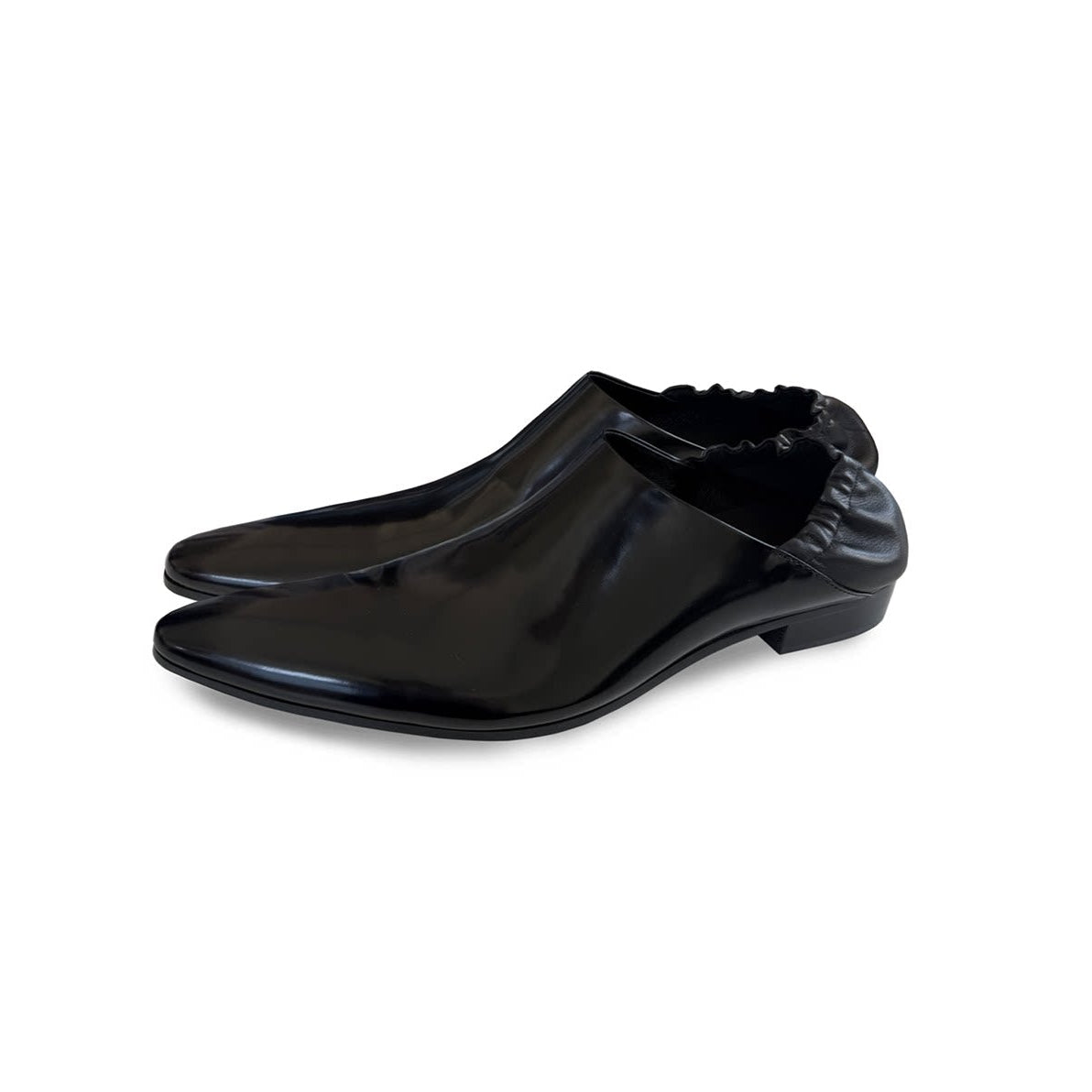 Split‑edge cowhide pointed‑toe black mirror mules