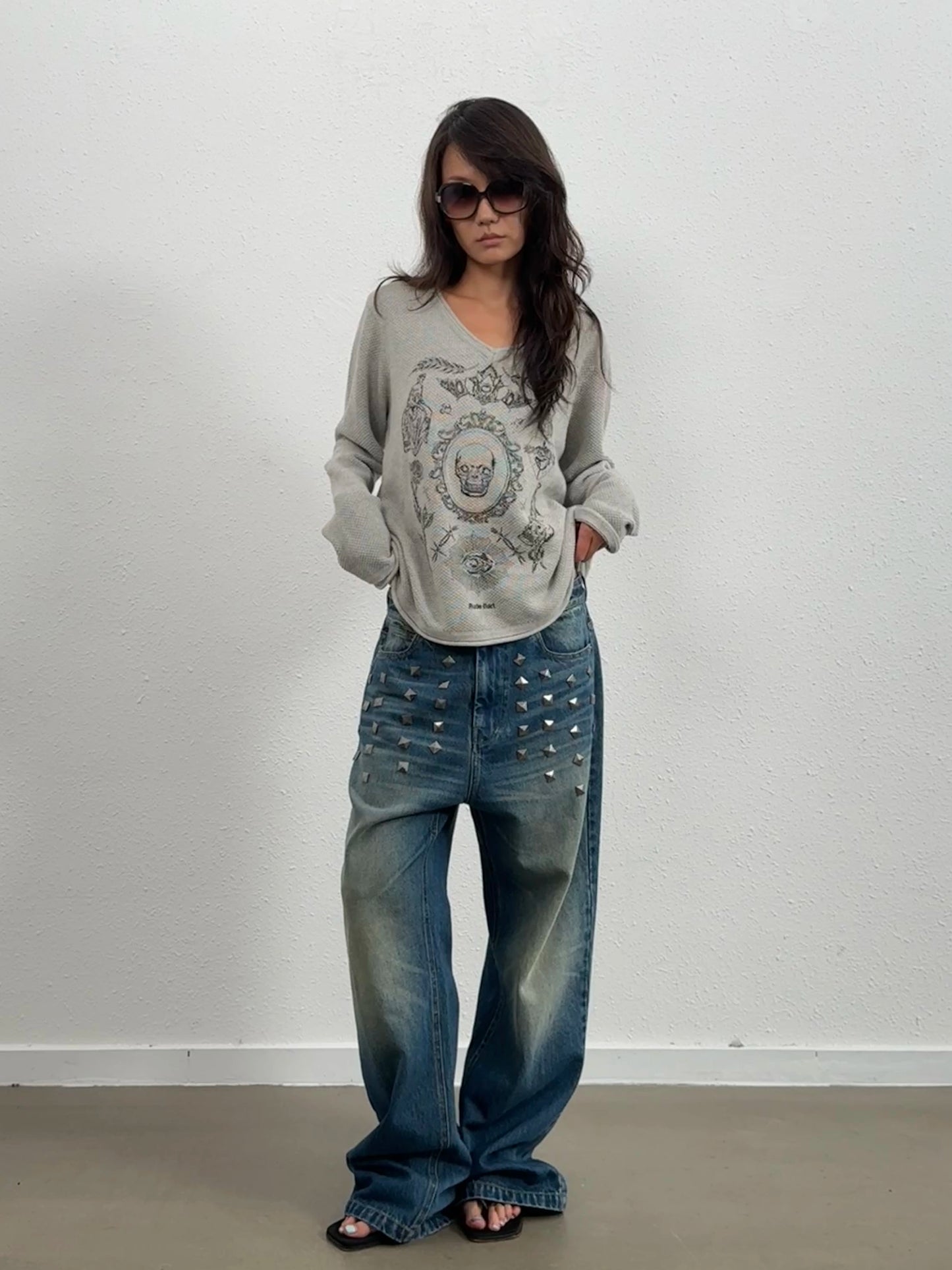 'SKULLTATTOO'  wool V-neck sweater