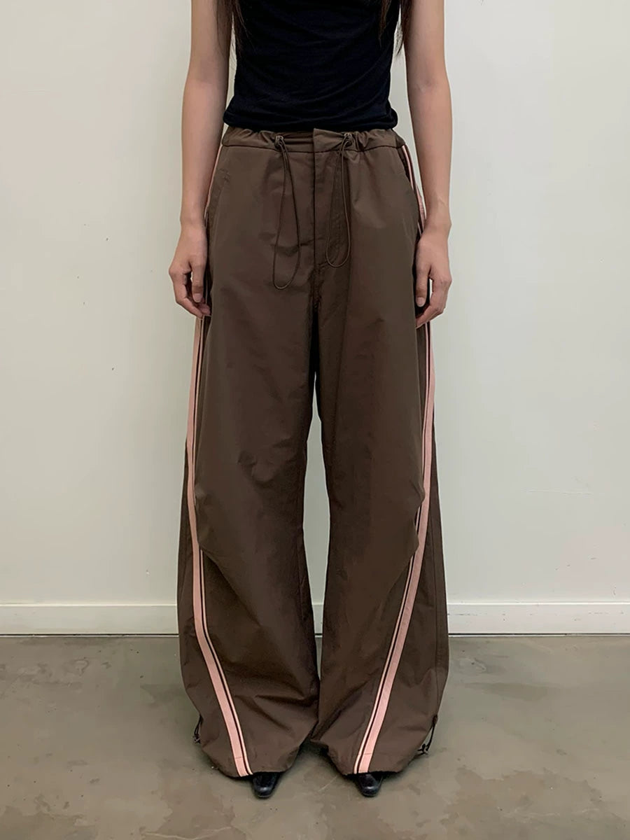 CONTRASTING LEATHER STRIPE TRACK PANTS