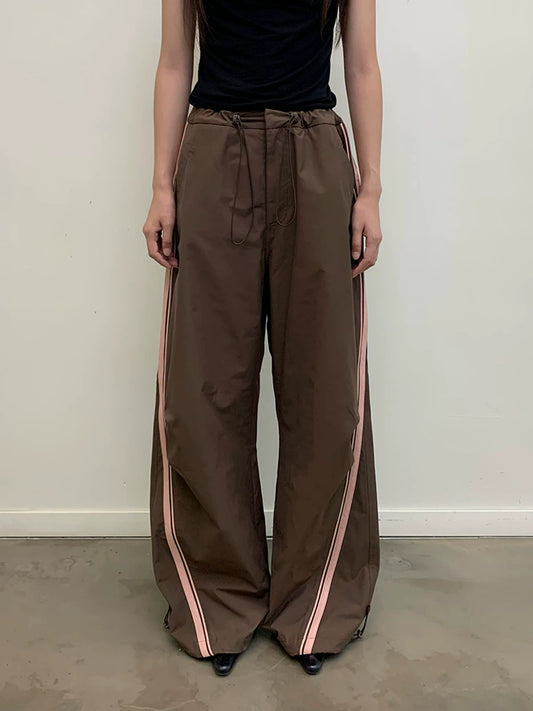 CONTRASTING LEATHER STRIPE TRACK PANTS