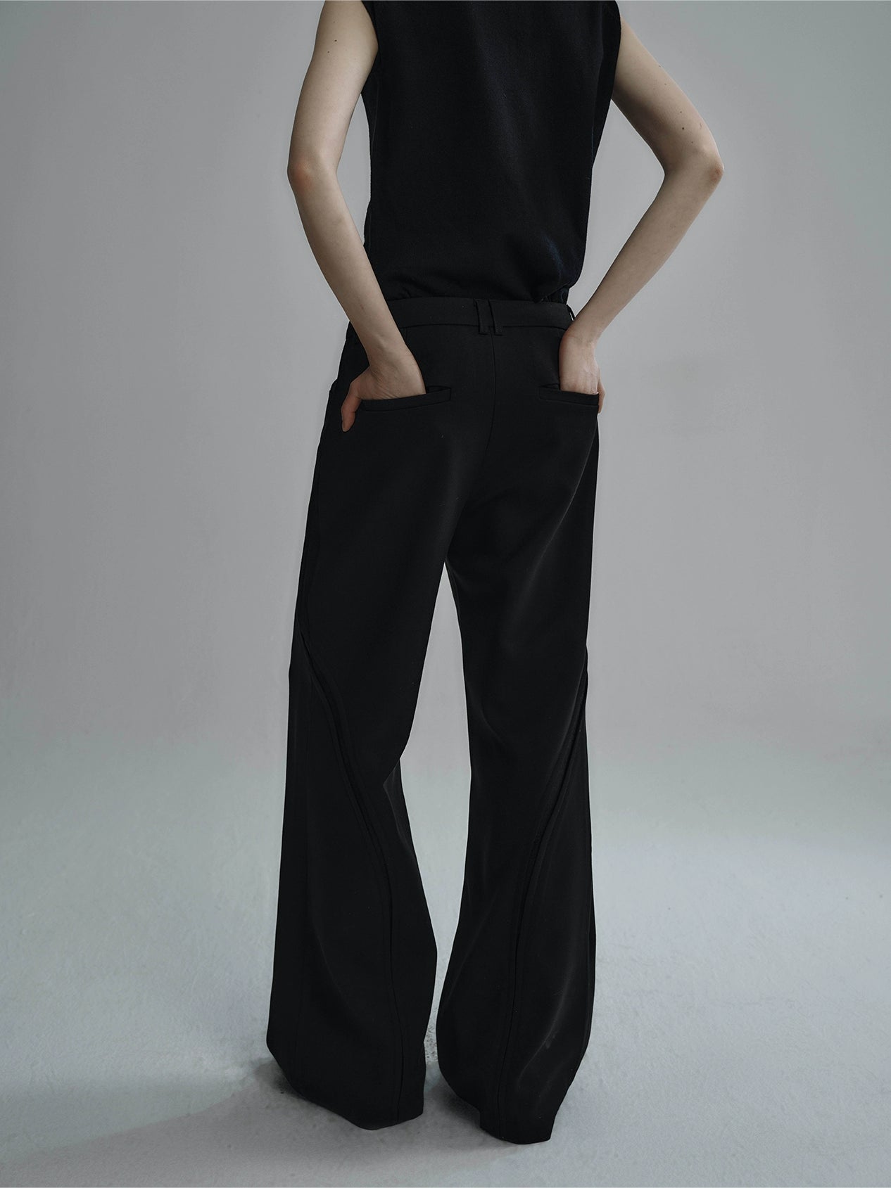 "Snake Trace" stitched dark flared trousers