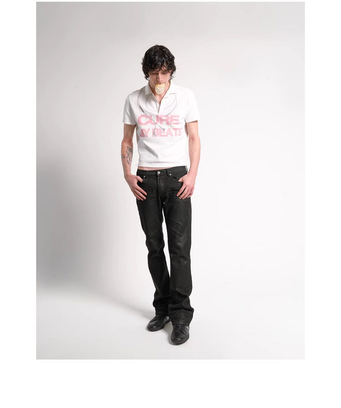 Wax coated bootcut jeans