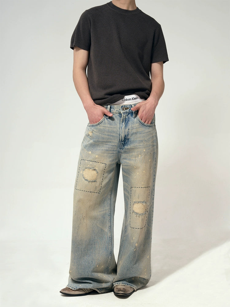 Hand stitch distressed jeans