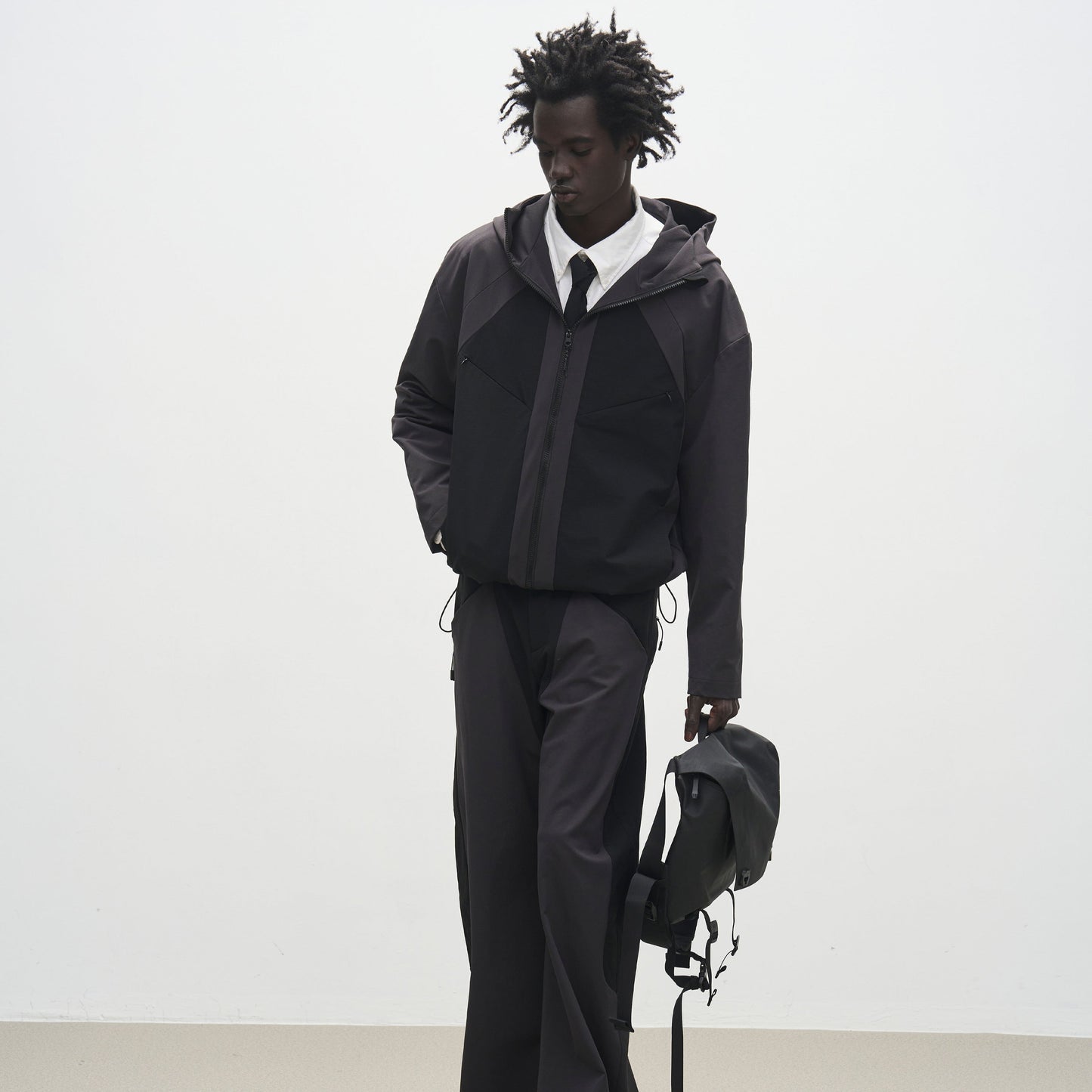 'Triangle' panel loose straight-leg softshell casual trousers