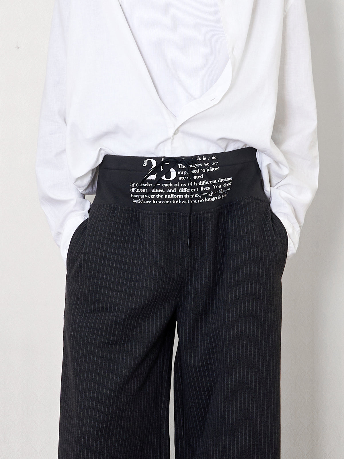 'stitch' cut wool mid-rise printed trousers