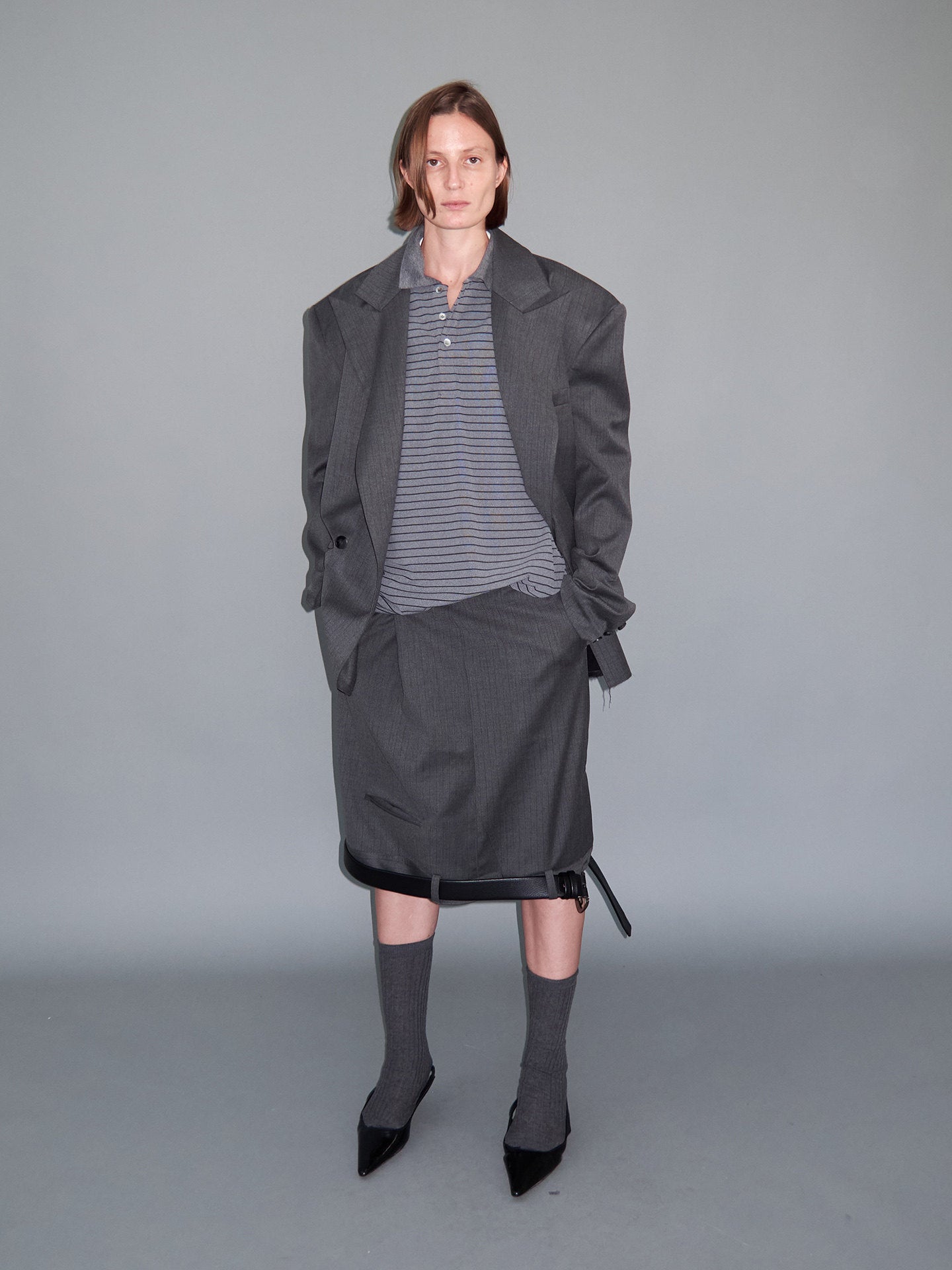 Flipped asymmetry waist suit skirt