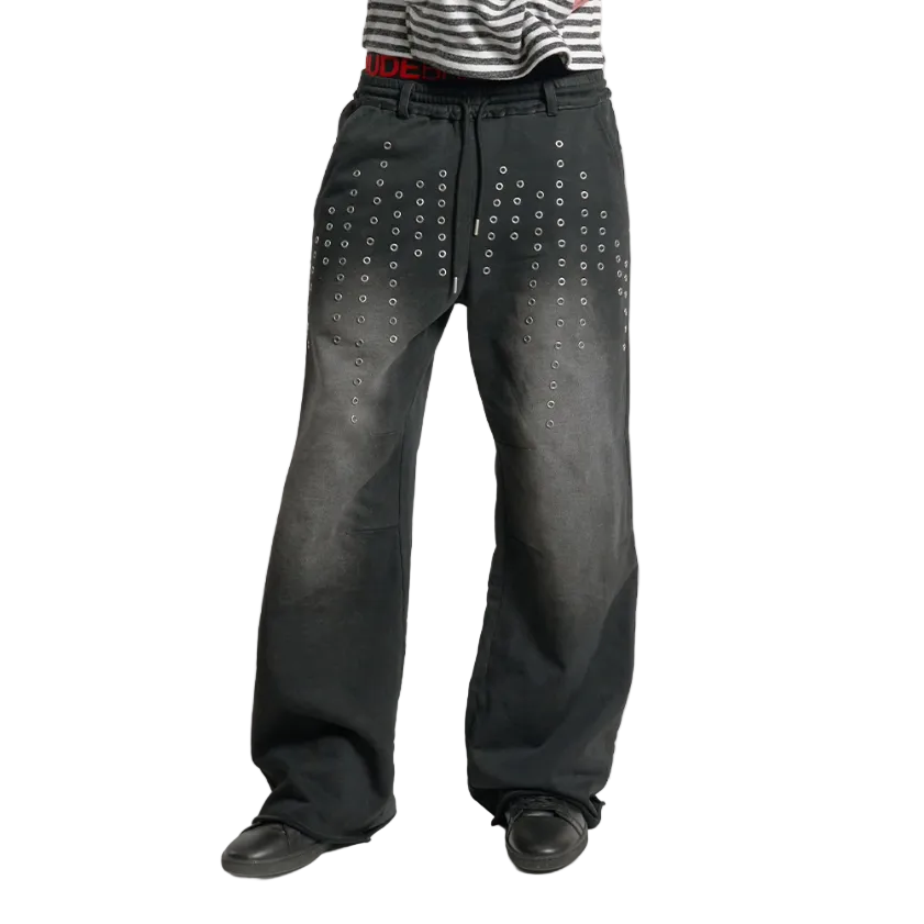 Hollow rivets washed baggy distressed sweatpants