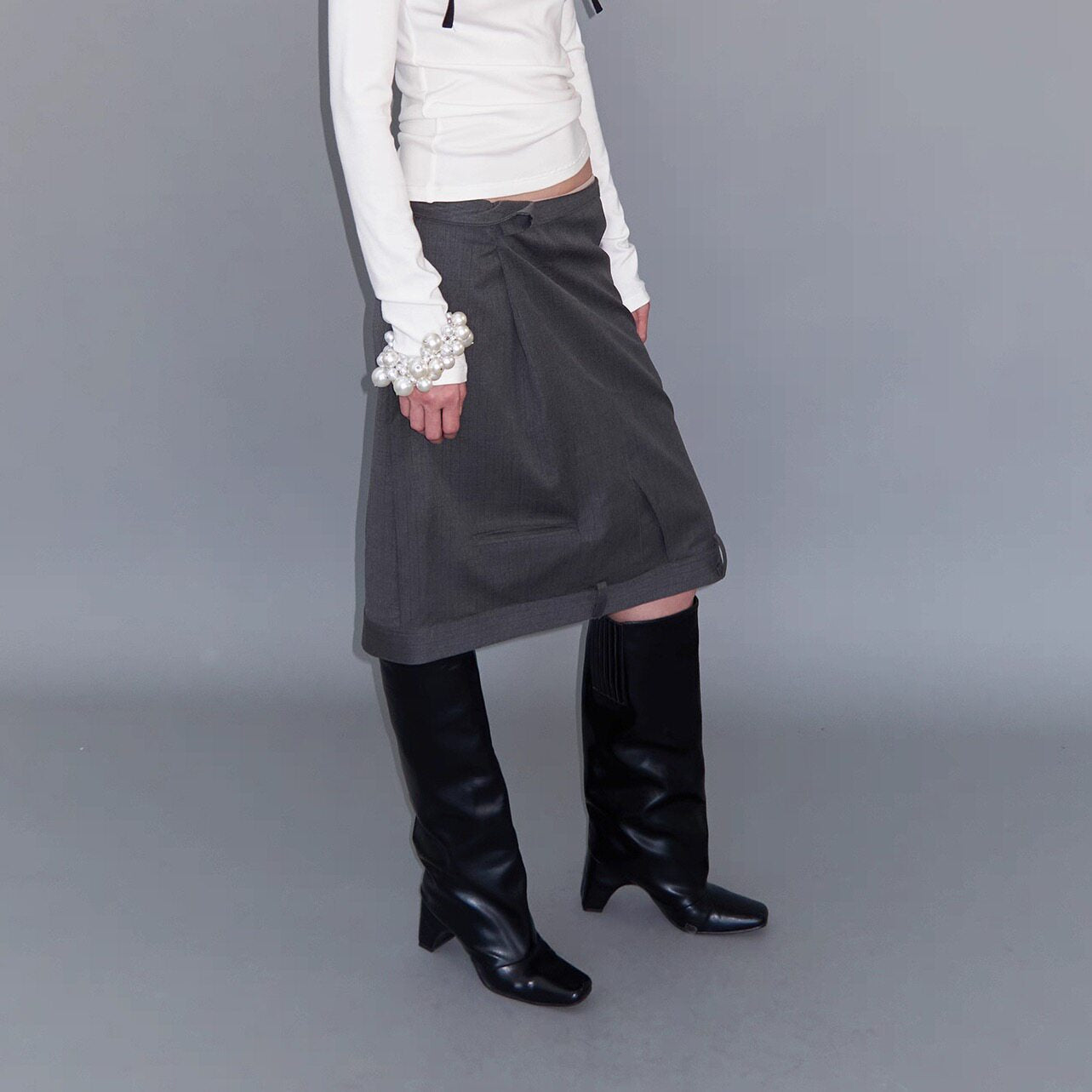 Flipped asymmetry waist suit skirt