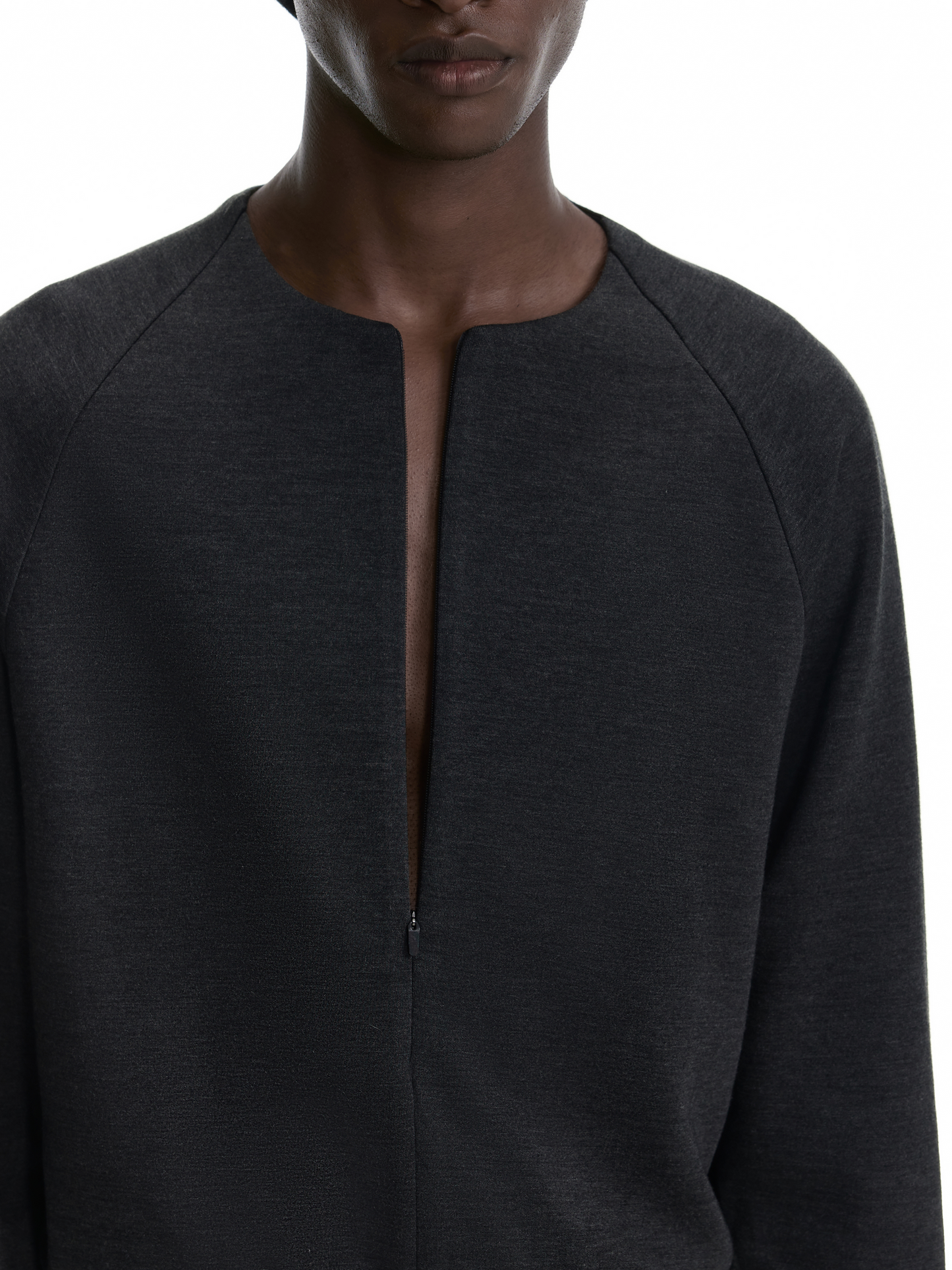 Curved zipper pullover
