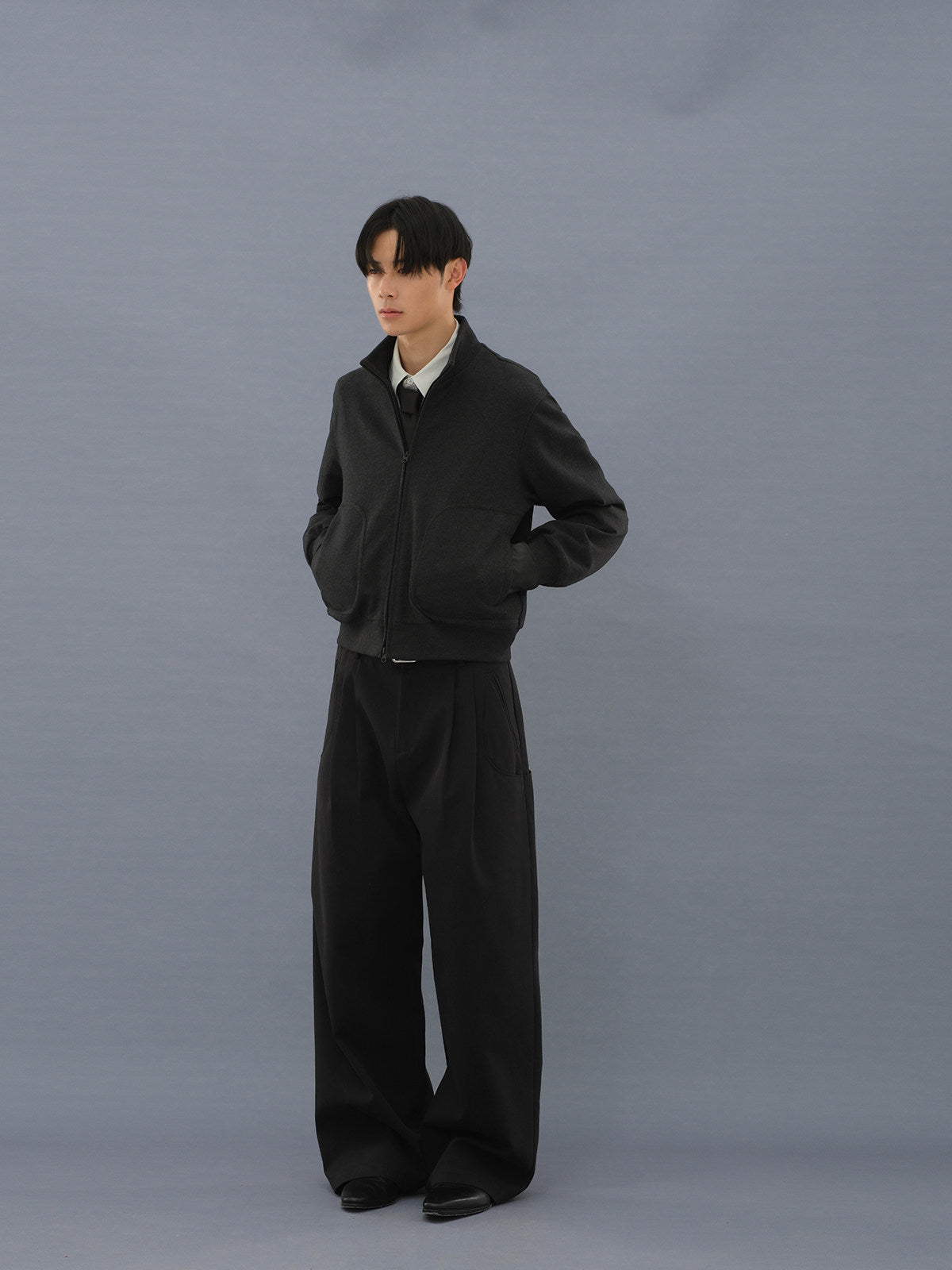 Curved pocket trousers