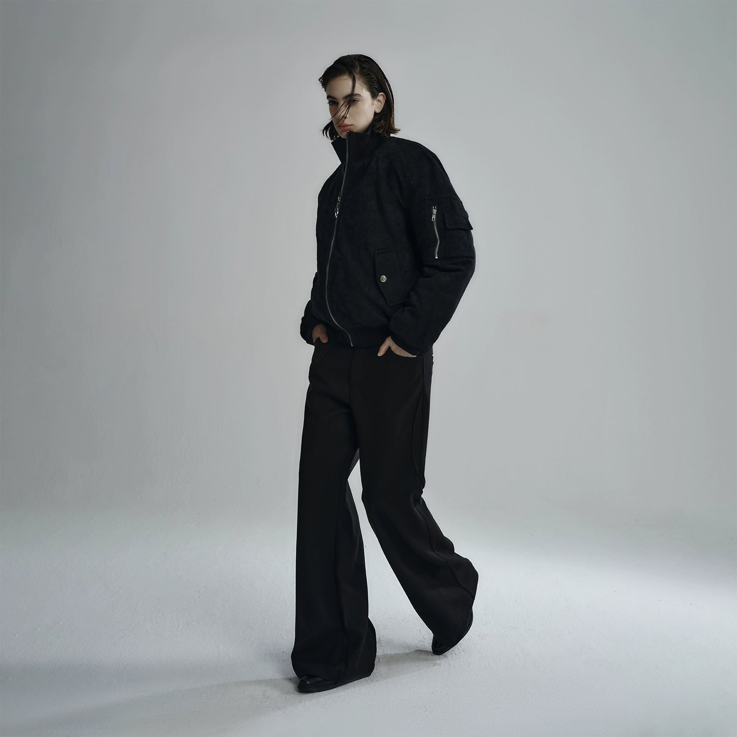 "Snake Trace" stitched dark flared trousers