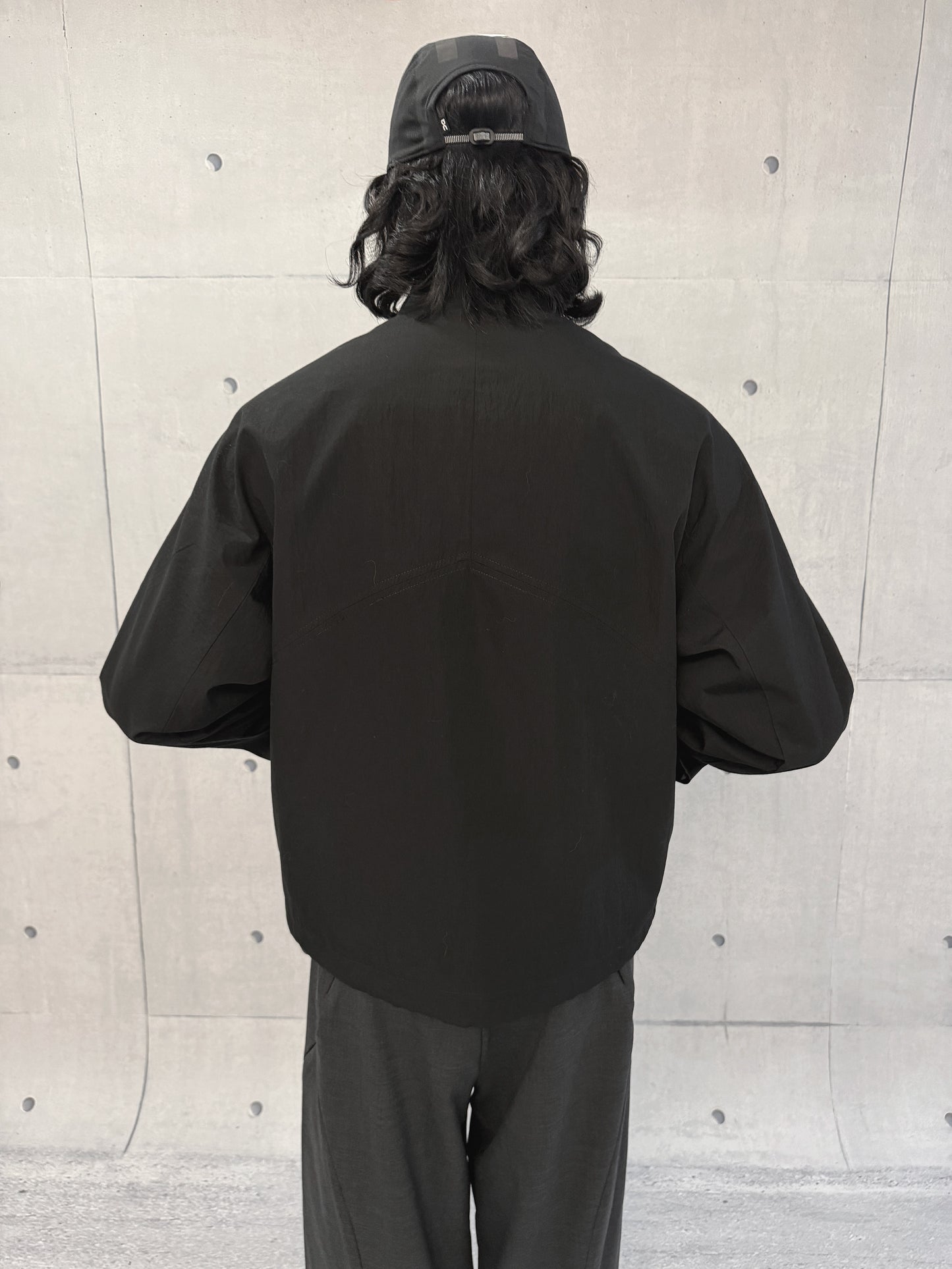 Micro-pleated multi-zip jacket