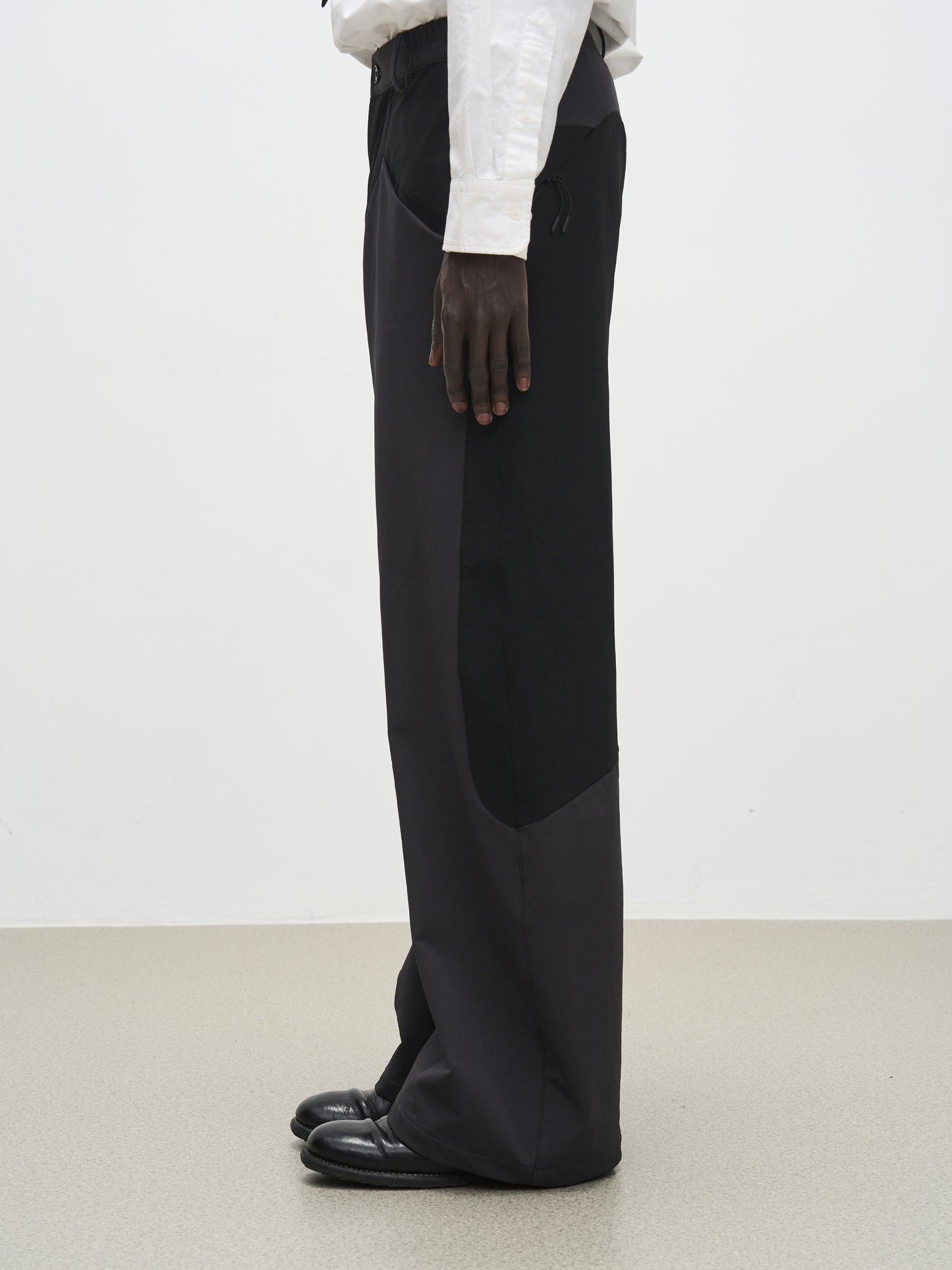 'Triangle' panel loose straight-leg softshell casual trousers