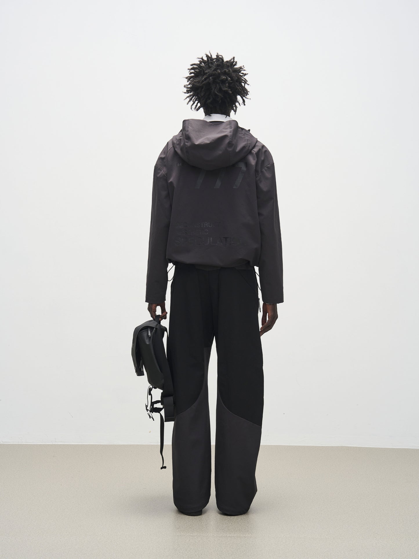 'Triangle' panel loose straight-leg softshell casual trousers