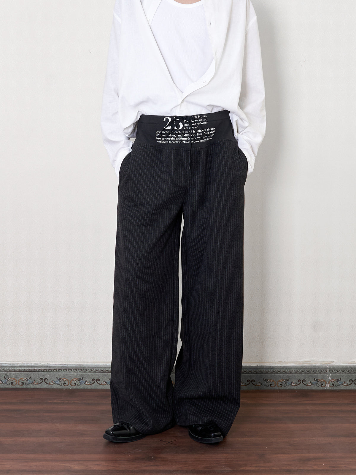 'stitch' cut wool mid-rise printed trousers