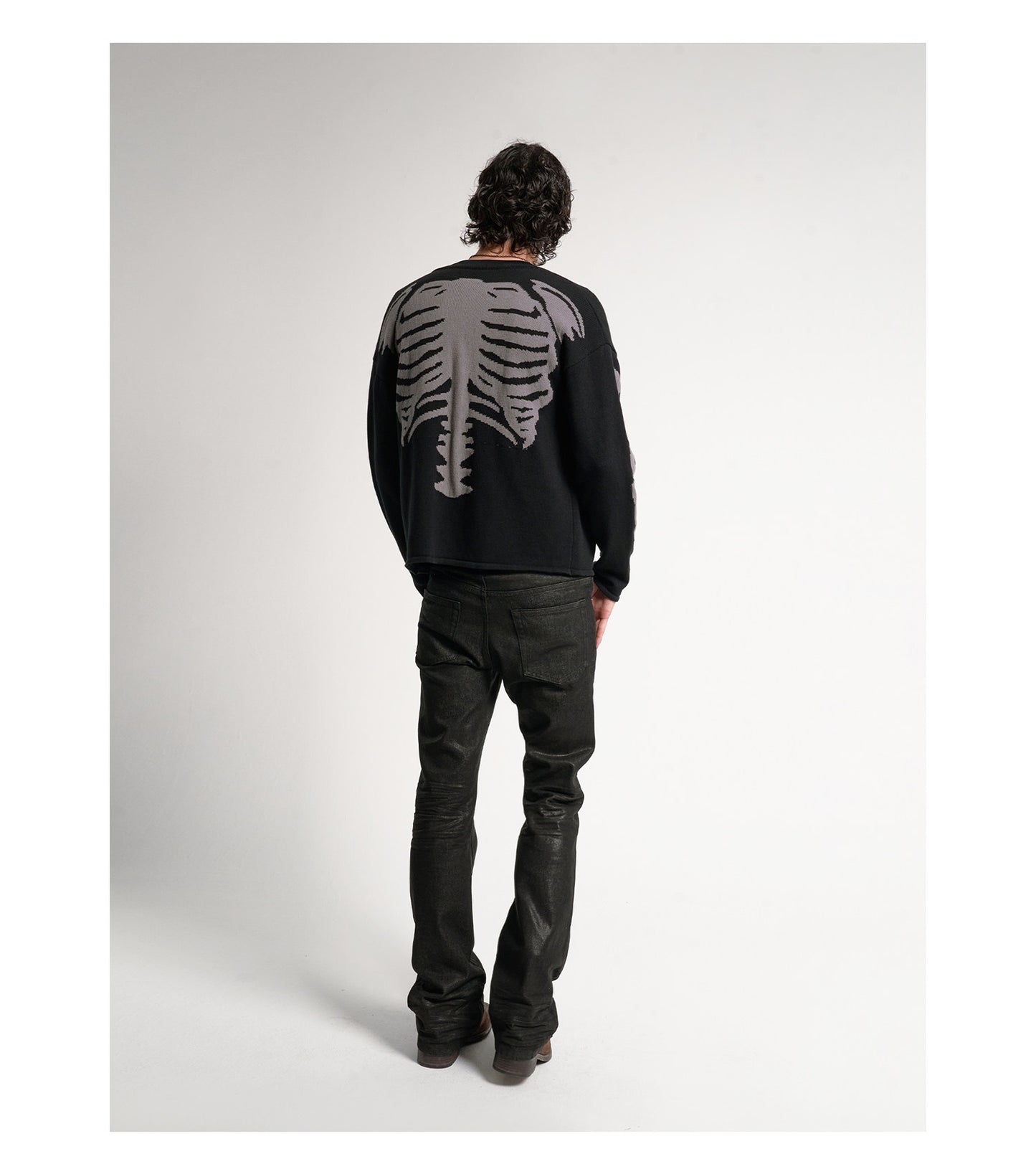 Wax coated bootcut jeans