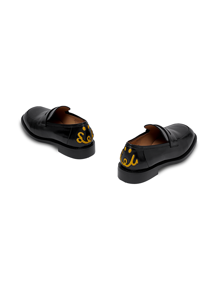 Oil wax cowhide smiley face embroidered loafers