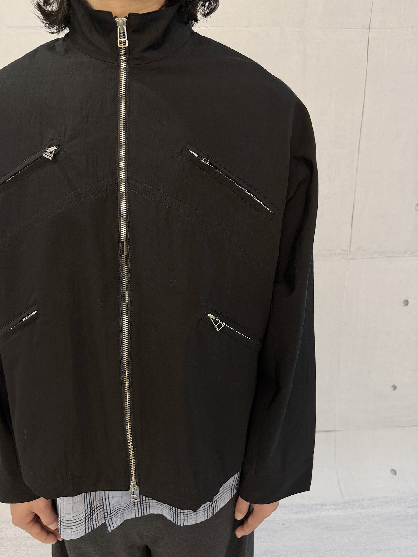 Micro-pleated multi-zip jacket