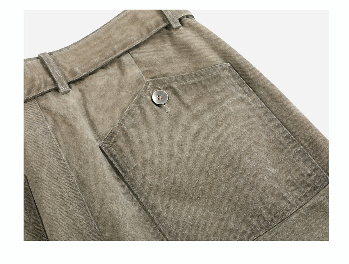 'Gneiss' mud dyed distressed belted trousers